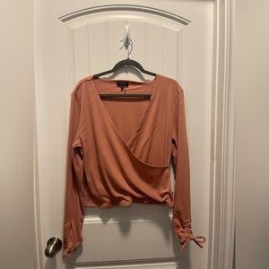 1. State
Womens size XL
NWT 

Women's pink Wrap Top